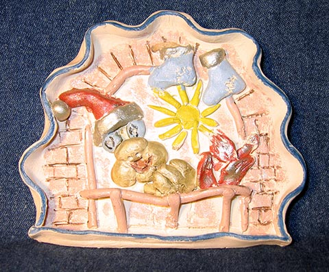 «Розетка «Камин». Глина. 2000 г. Работа периода учёбы в детской художественной школе г. Новомосковска (Россия).